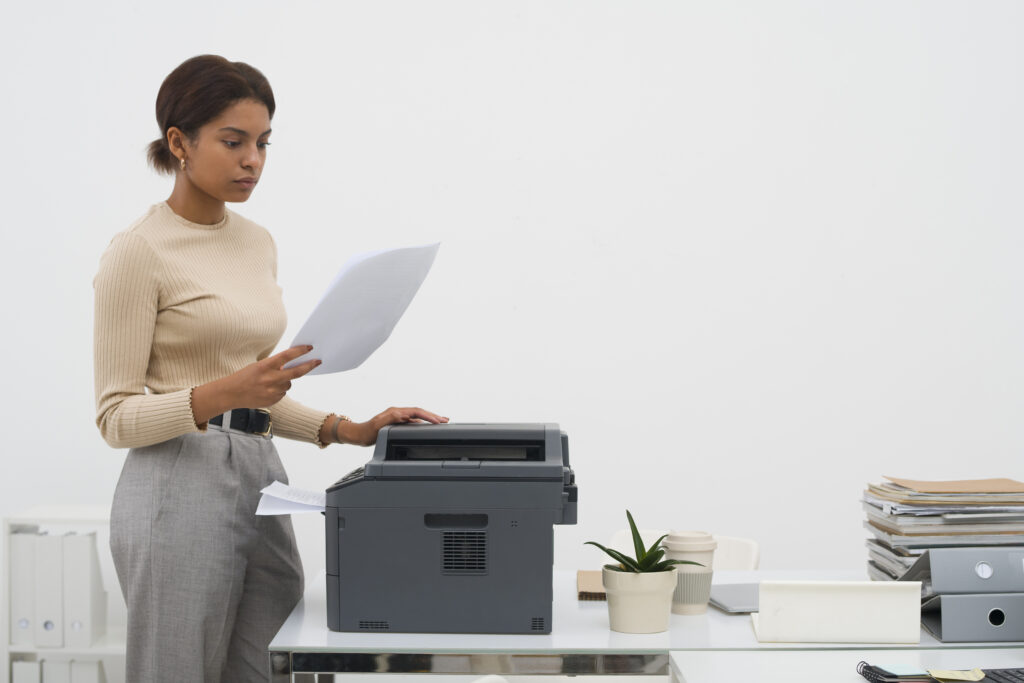 Woman printing at office in Sri Lanka Search Advanced Technology